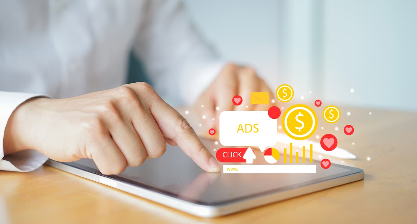 Digital image of ppc ads over an ipad. 