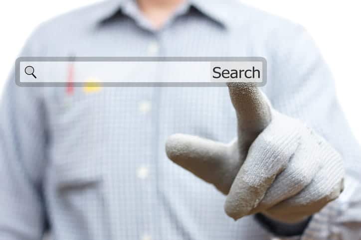A plumber with a graphic of a search bar overtop.