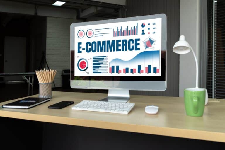 Ecommerce analytics dashboard on a desktop screen showing charts and performance graphs related to online store growth and SEO insights.